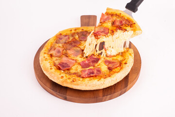 Pizza party. Hand picking slice of pizza.