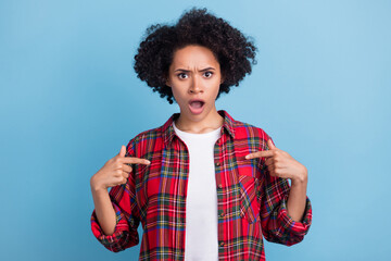 Photo of young afro girl amazed shocked surprised point fingers herself accuse blame isolated over blue color background