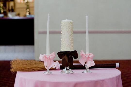 Closeup shot of a unity candle on a table
