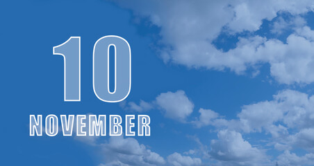 Fototapeta premium november 10. 10-th day of the month, calendar date.White numbers against a blue sky with clouds. Copy space, autumn month, day of the year concept