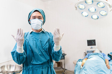 Fototapeta na wymiar portrait of two surgeons standing in the operating room. Surgery and emergency concept