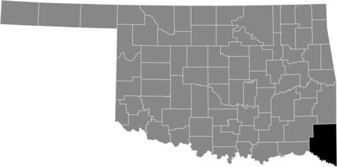 Black highlighted location map of the McCurtain County inside gray administrative map of the Federal State of Oklahoma, USA