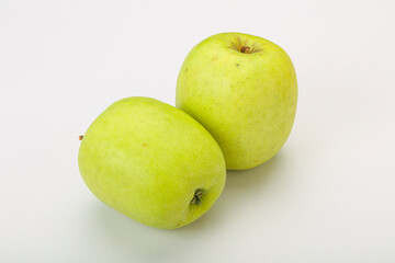 Two ripe green sweet apples