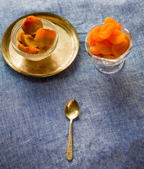 High angle view of fresh peach and dried apricots from Ladakh region in India .Served in...