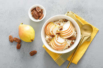 Oatmeal with cottage cheese, pecan nuts and pear for breakfast