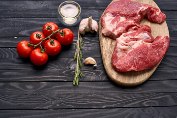 meat steak on wooden board ingredients top view food