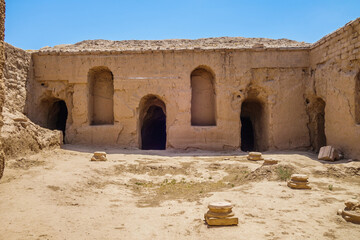 Building in Buddhist settlement of II century on Kara-Tepe hill, Termez, Uzbekistan. Entrances lead...