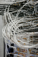Many cables connecting various electronic devices inside science lab. Close up shot, no people