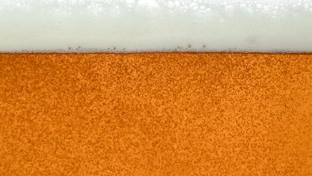 Background of beer with bubbles in glass p2