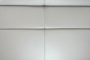 Close up detail of cream leather furniture.