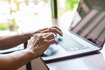 man using notebook for work