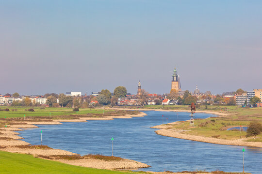 The Dutch river IJssel in front of the historic city of Zutphen in Gelderland, The Netherlands