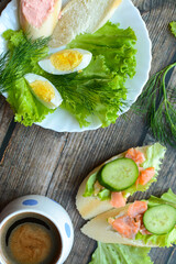 Healthy breakfast, salad, eggs and salmon