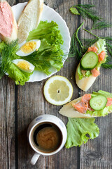 Healthy breakfast, salad, eggs and salmon