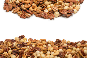 Mix of nuts isolated on white background. Top view.