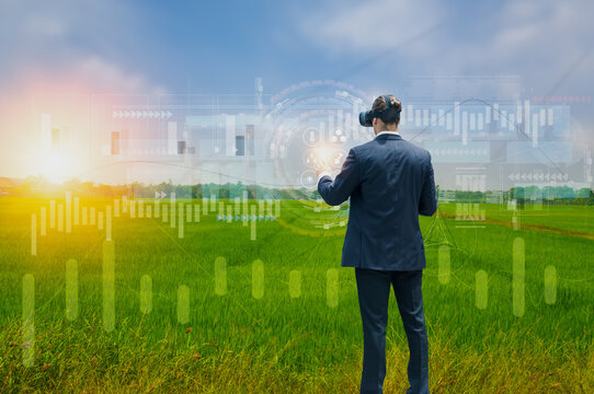 Businessman use VR glasses touch interface monitor analysis agricultural product,crop growth,track quality inspection agriculture,concept,using technology track productivity,satellite for agriculture