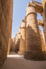 Anscient Temple of Karnak in Luxor - Ruined Thebes Egypt. Huge columns with hieroglyphs in the...