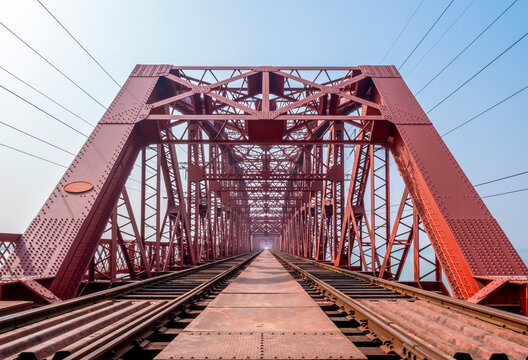 Harding Bridge. An old steel railroad bridge over the wide and fast river Padma.