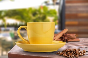 Tasty coffee drink of liqueurs and cream liqueur on wooden table.