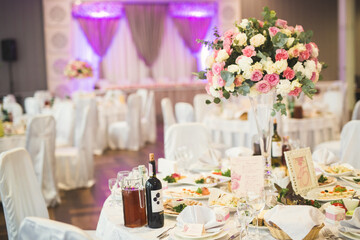 Interior of a restaurant prepared for wedding ceremony