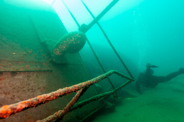 Diver exploring a Great Lakes shipwreck found in Lake Superior