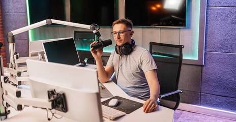 The DJ hosts the program and communicates with the audience on air at the radio station. The...