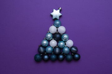 Creative Christmas tree made from Christmas balls. New Year card, top view, flat lay.