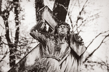 statue on grave in the old cemetery