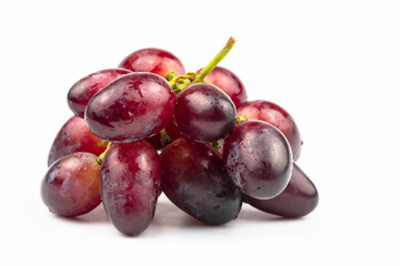 Fresh pink grapes isolated on a white background.