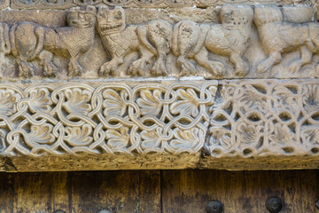 The Collegiate Church of San Pedro de Cervatos is a Romanesque Catholic temple located in Cervatos, in the municipality of Campoo de Enmedio, Cantabria, Spain. Detail of erotic corbels