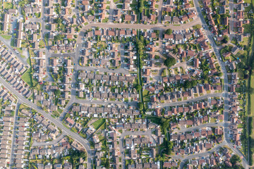 Straight down aerial drone photo of the town of Huntington in York in the UK showing residential British housing estates and rows of semi detached bungalows in the town on a sunny summers day