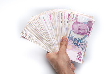Man counting Turkish money with his hand. Turkish lira banknotes.