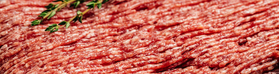 Fresh Raw Beef Minced Meat. Food recipe background. Close up. Long banner format. top view