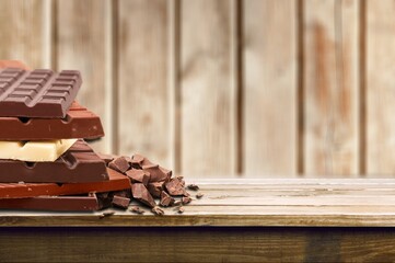 Sweet tasty chocolate candy on the desk