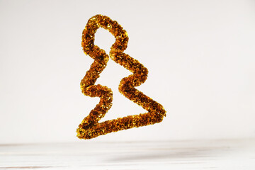 New Year's, Christmas tree levitates on a white background.