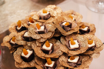 Wedding sweets - chocolate candy with apricot