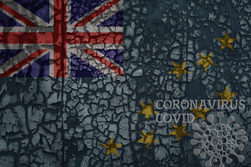 flag of Tuvalu on a old metal rusty cracked wall with text coronavirus, covid, and virus picture.