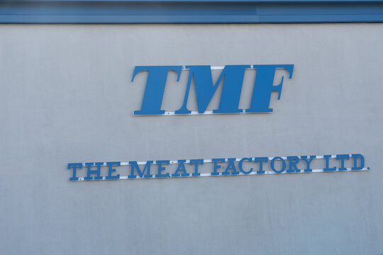 Stoney Creek, ON, Canada - October 27, 2021:  Close up of TMF Meat Factory LTD sign on their facility building in Stoney Creek, ON, Canada. 