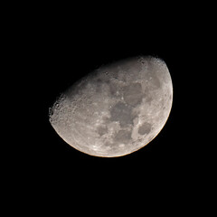A Waxing Gibbous Moon against Black Sky