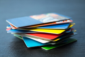 Stack of bank cards on a black background. black friday, sale
