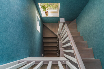 Staircase with wooden steps in a private house top view