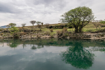 The Podgorica river at the Niagara waterfall with reflecting trees