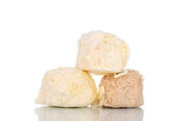 Three sweet cotton candy, close-up, isolated on white.