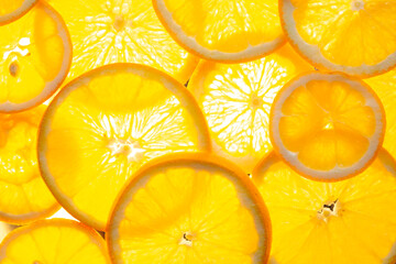 Fresh orange slices on a glowing surface