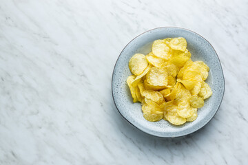 Crunchy potato chips. Potato crisps.