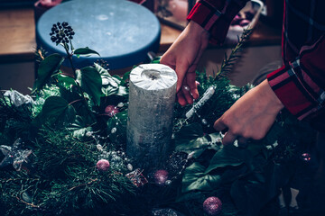 creating christmas advent wreath at home with children from natural material