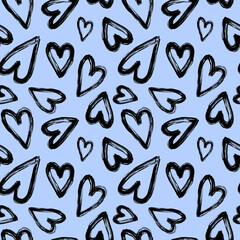 Black brush stroke hearts on blue background seamless pattern. Black paint heart repeat print. Valentine's day ornament for textile, fabric, wallpaper, wrapping paper, design and decoration.