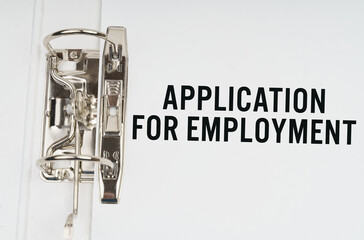 In the folder under a paper clip there is a white sheet with the inscription - Application for employment