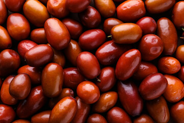 Heap of ripe red dates as background, closeup