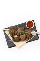 
fresh kebab on skewers on white background